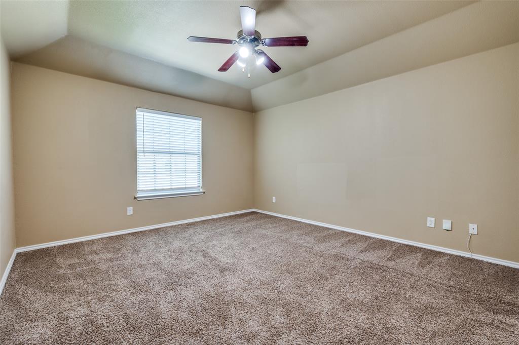 430 Woodgrove Drive, Unit A & B Little Elm, TX 75068 - Photo 10 of 20 an empty room with windows and chandelier fan
