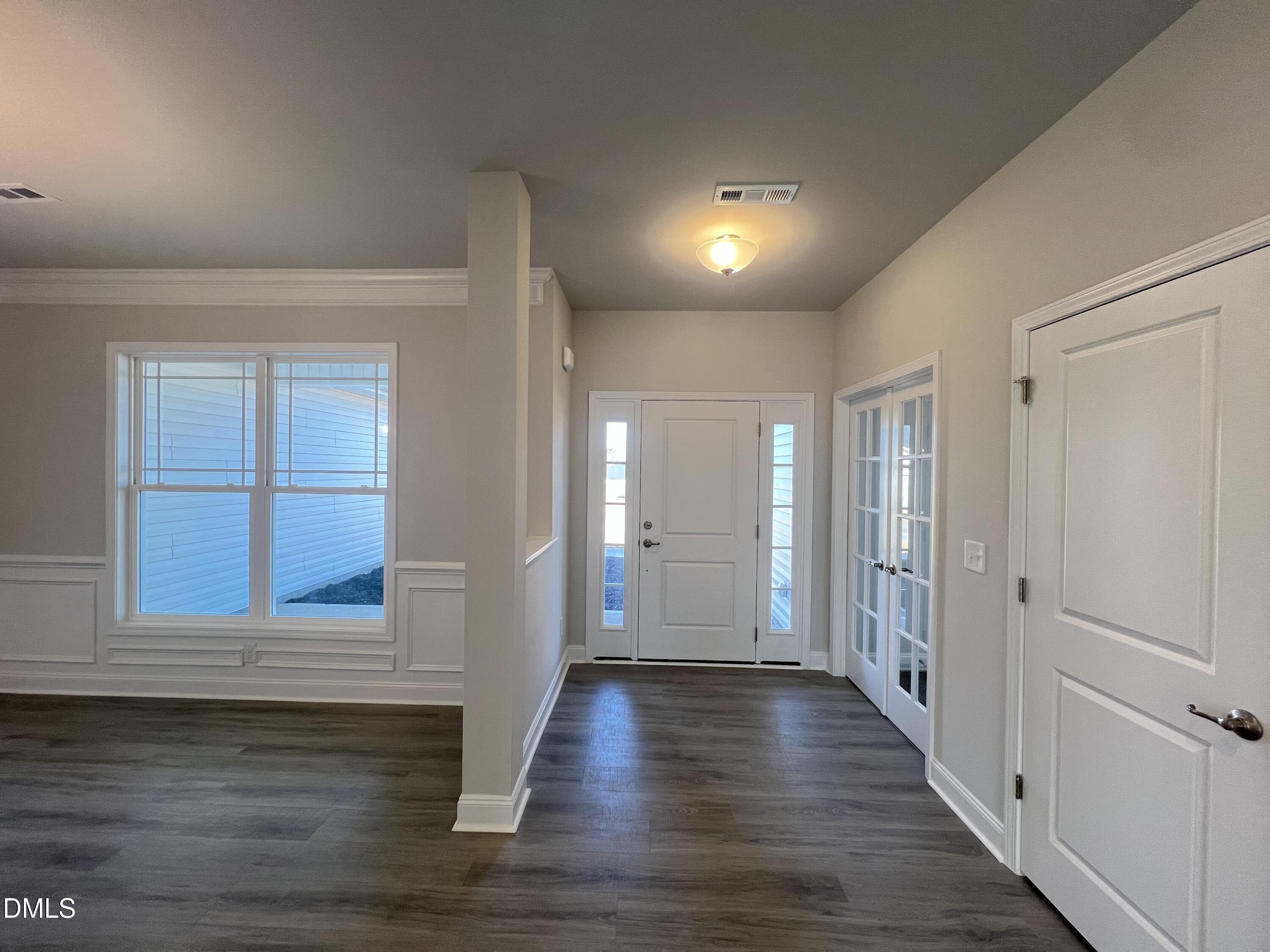 4009 Fletcher Road Bailey, NC 27807 - Photo 7 of 38 a view of a hallway with wooden floor