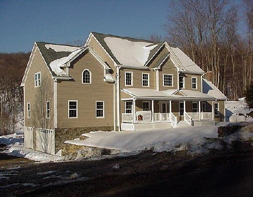187 Hattertown Road Monroe, CT 06468 - Photo 1 of 1 a view of a white house with large windows