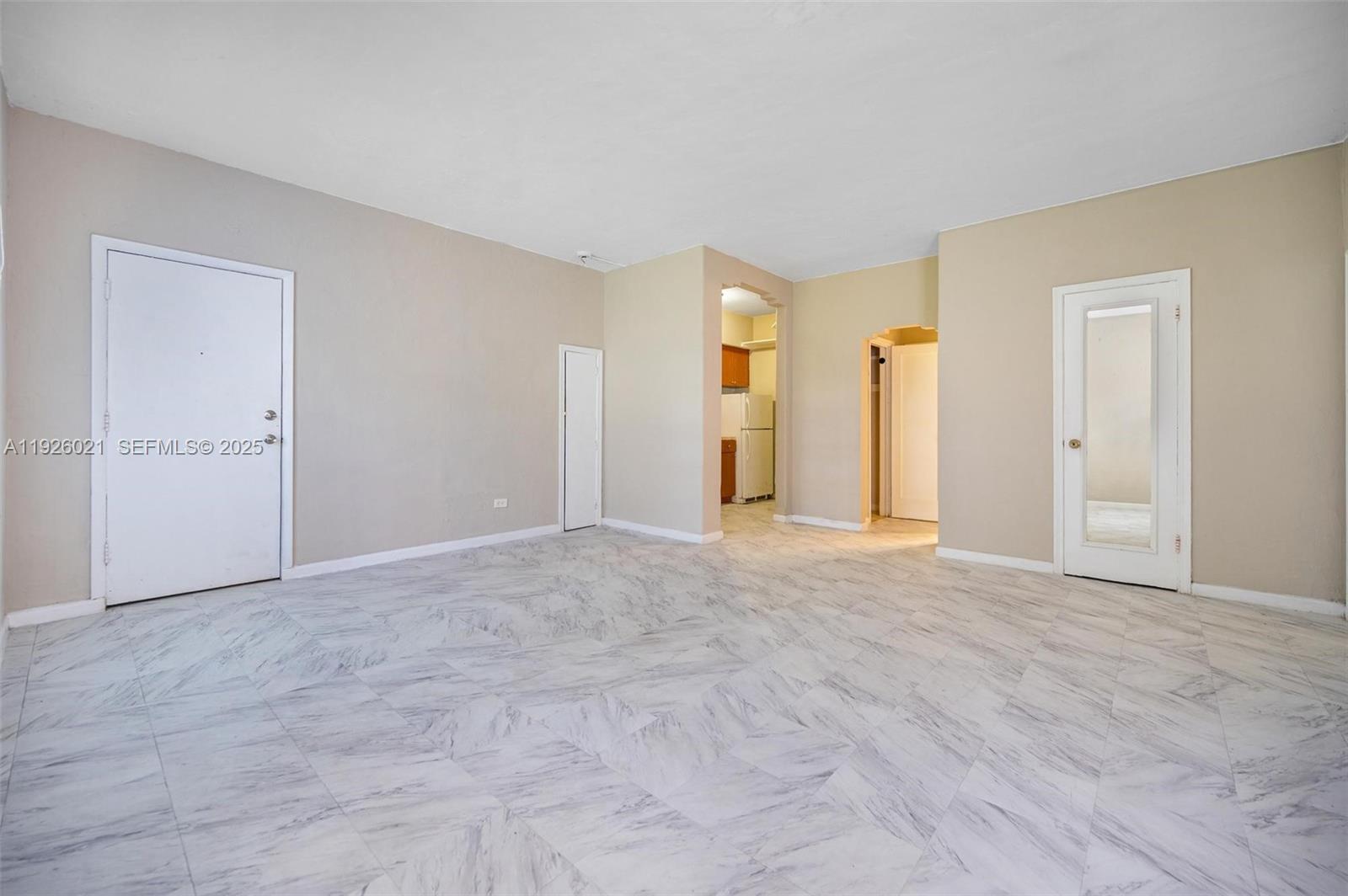 825 Alton Road, Unit 2 Miami Beach, FL 33139 - Photo 4 of 7 a view of an empty room