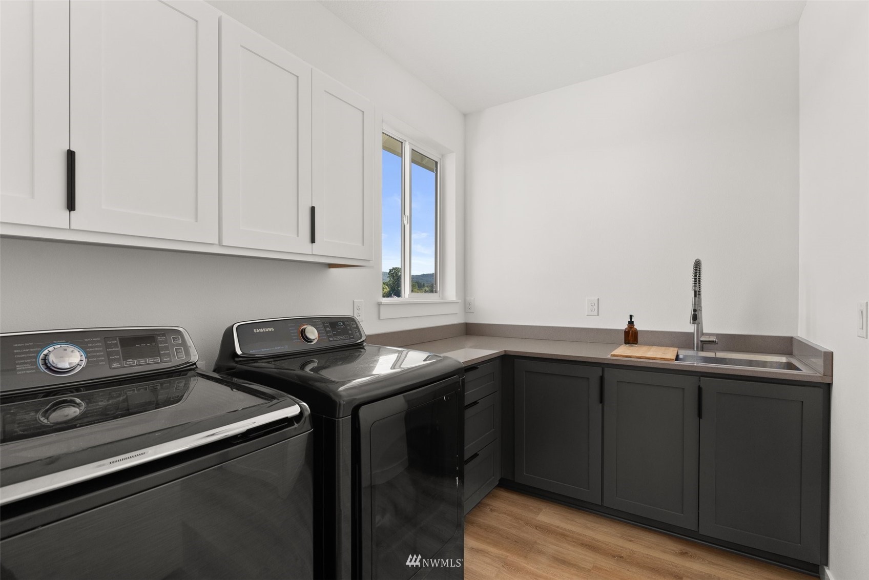 562 Boistfort Road Curtis, WA 98538 - Photo 22 of 33 a kitchen with a sink and cabinets