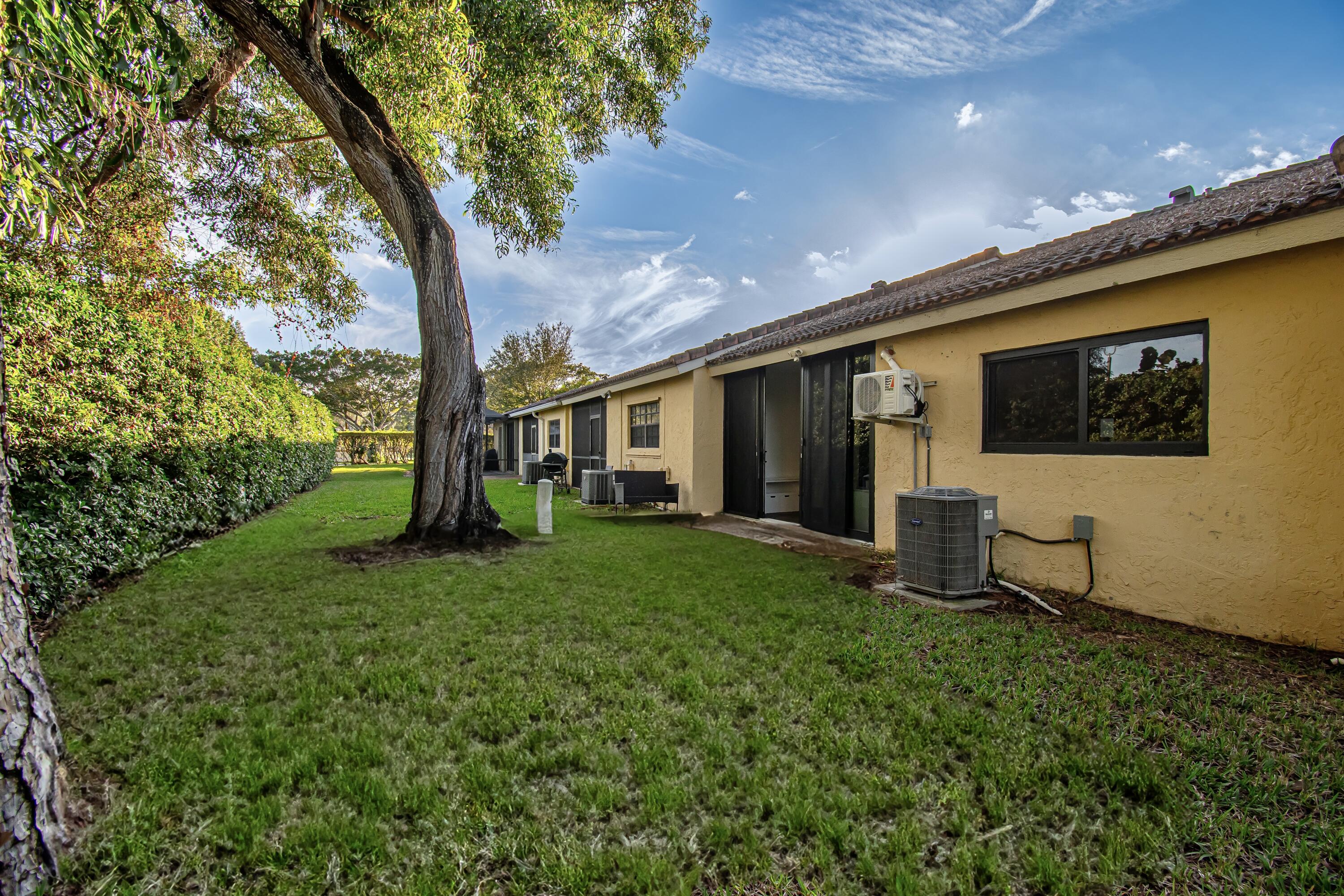 6825 Bridlewood Court Boca Raton, FL 33433 - Photo 31 of 31 a view of a porch with a tree