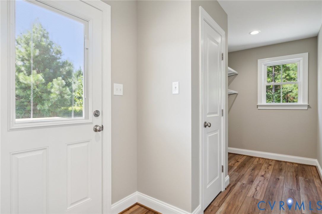 527 Salem Church Road Cumberland, VA 23040 - Photo 13 of 33 a view of hallway with window and wooden floor