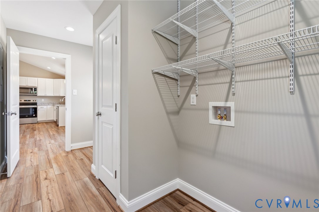 527 Salem Church Road Cumberland, VA 23040 - Photo 14 of 33 a view of a hallway with wooden floor