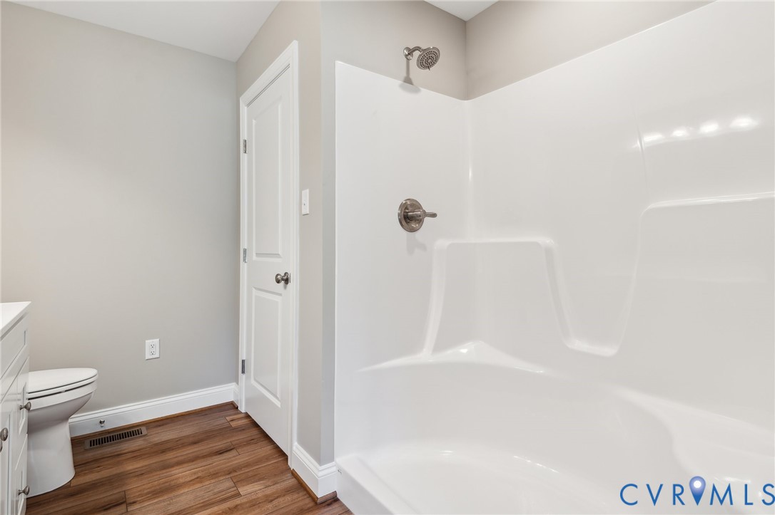 527 Salem Church Road Cumberland, VA 23040 - Photo 15 of 33 a bathroom with a shower and a toilet