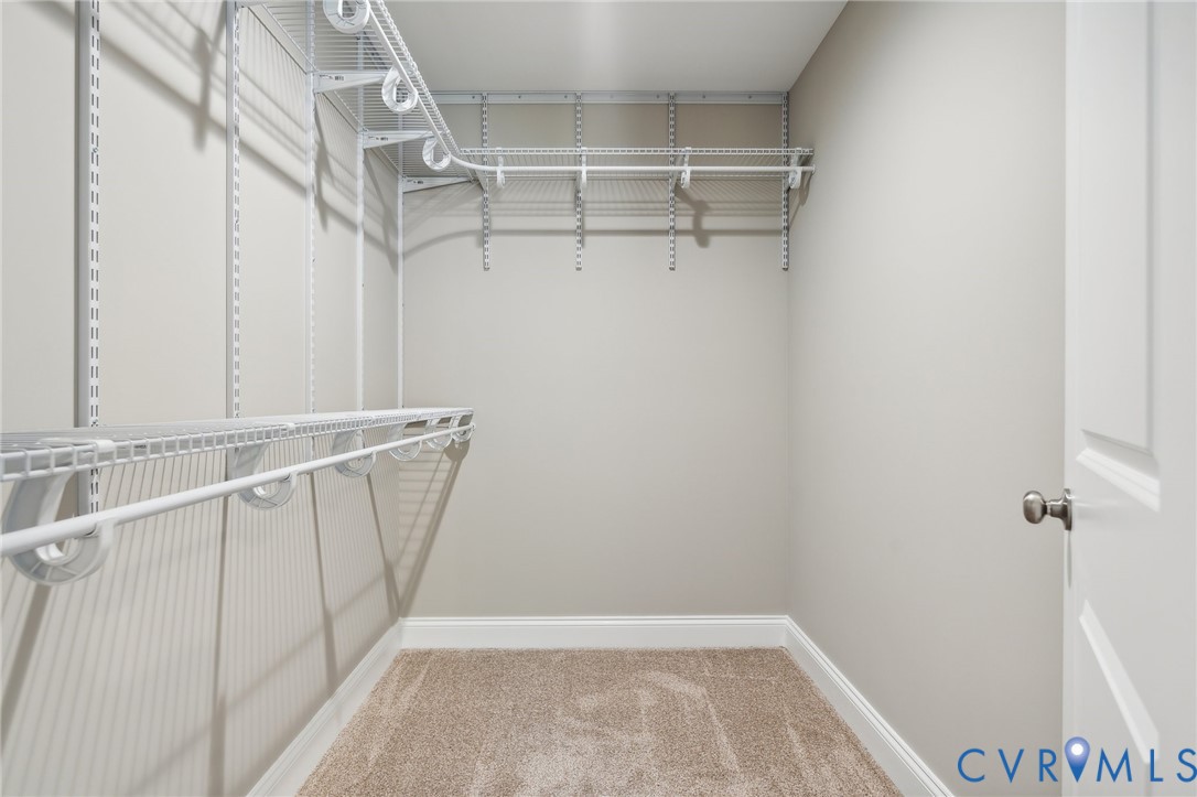 527 Salem Church Road Cumberland, VA 23040 - Photo 21 of 33 a view of walk in closet with empty racks