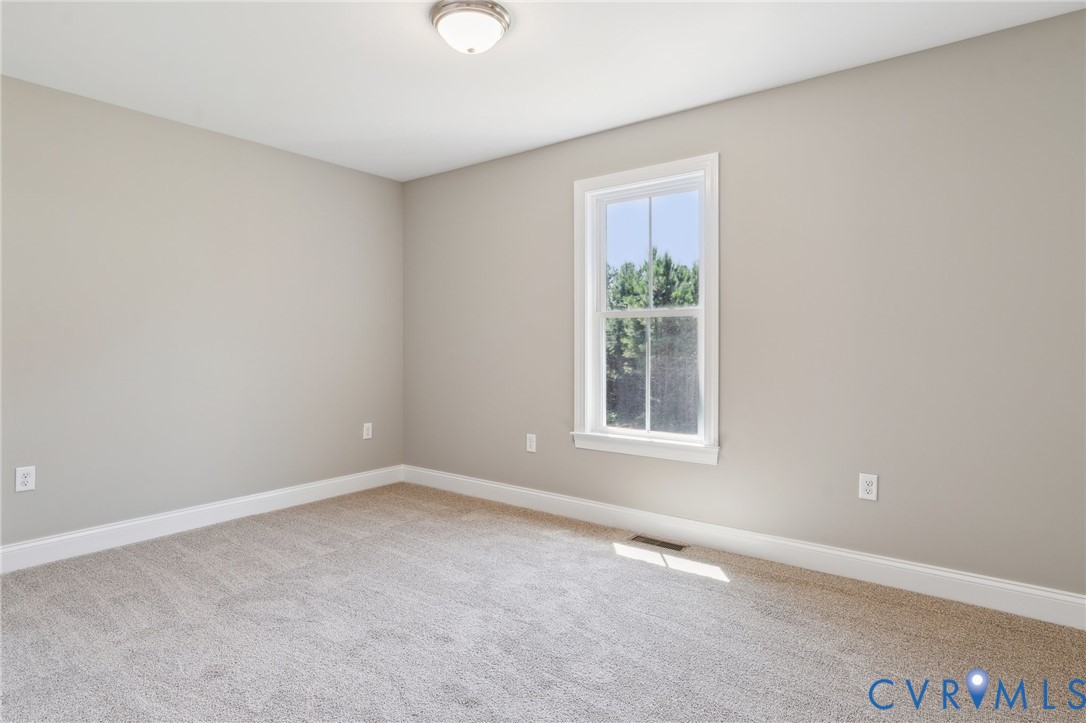 527 Salem Church Road Cumberland, VA 23040 - Photo 22 of 33 an empty room with a window