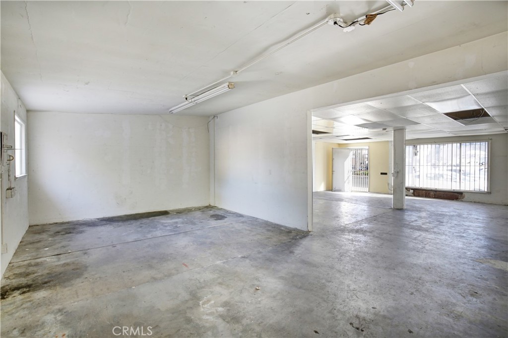 8949 Atlantic Avenue South Gate, CA 90280 - Photo 17 of 43 an empty room with windows and entrance