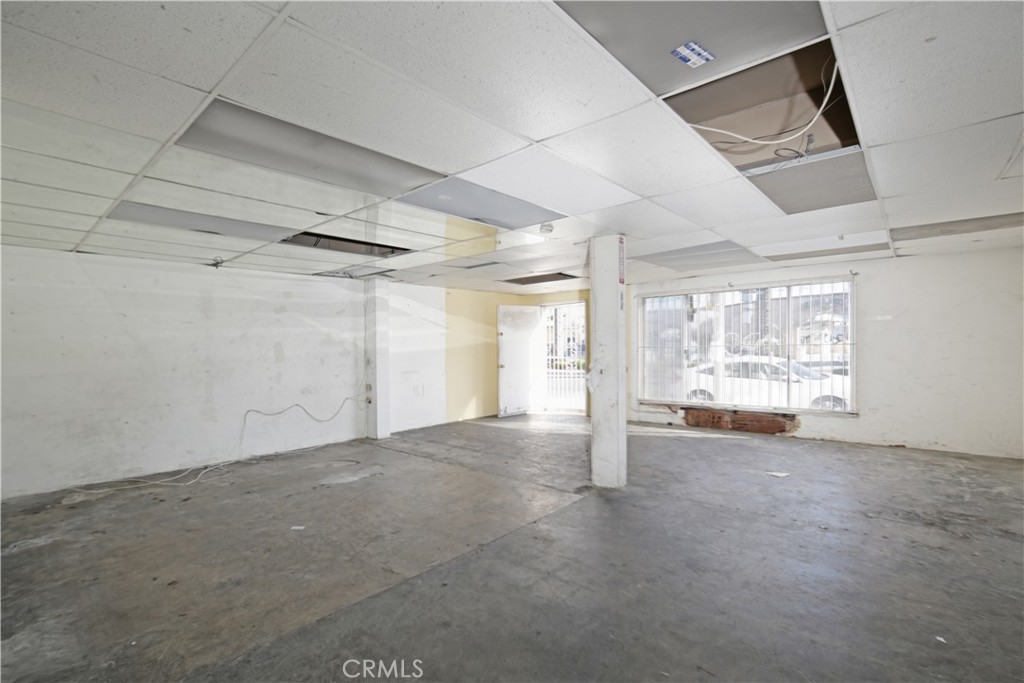 8949 Atlantic Avenue South Gate, CA 90280 - Photo 18 of 43 a view of an empty room with a window