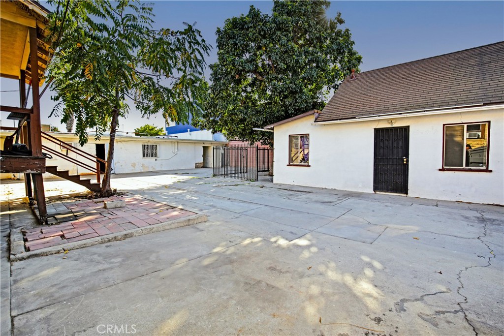 8949 Atlantic Avenue South Gate, CA 90280 - Photo 21 of 43 a house with trees in front of it
