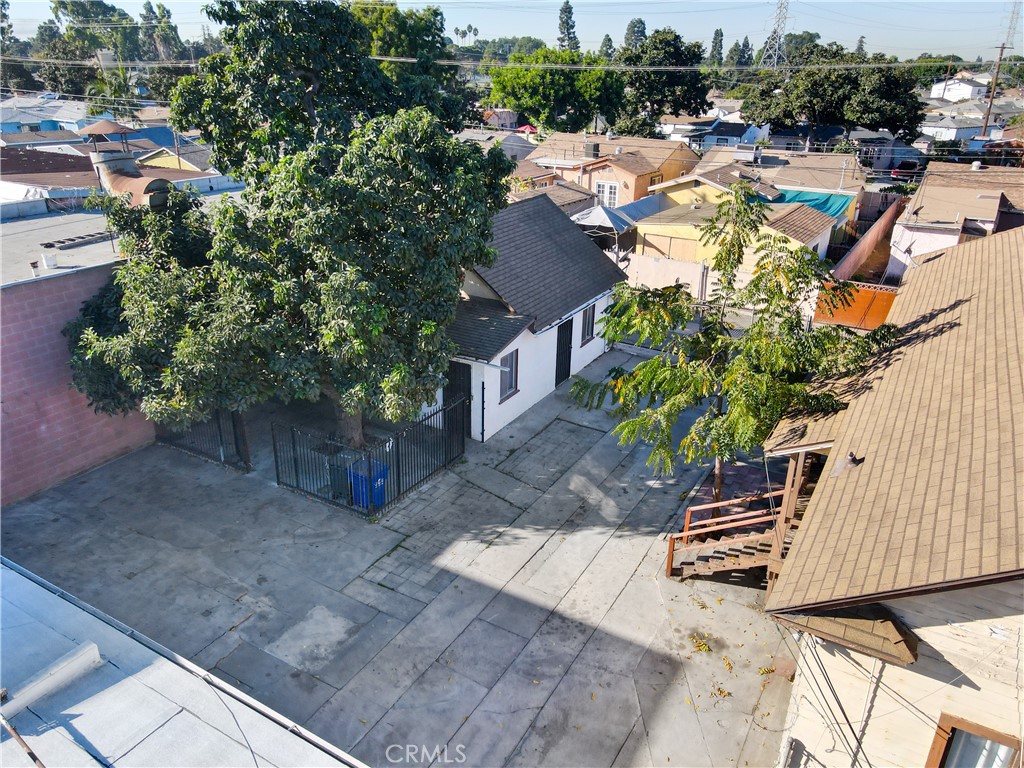 8949 Atlantic Avenue South Gate, CA 90280 - Photo 35 of 43 a view of a house with a yard and sitting area