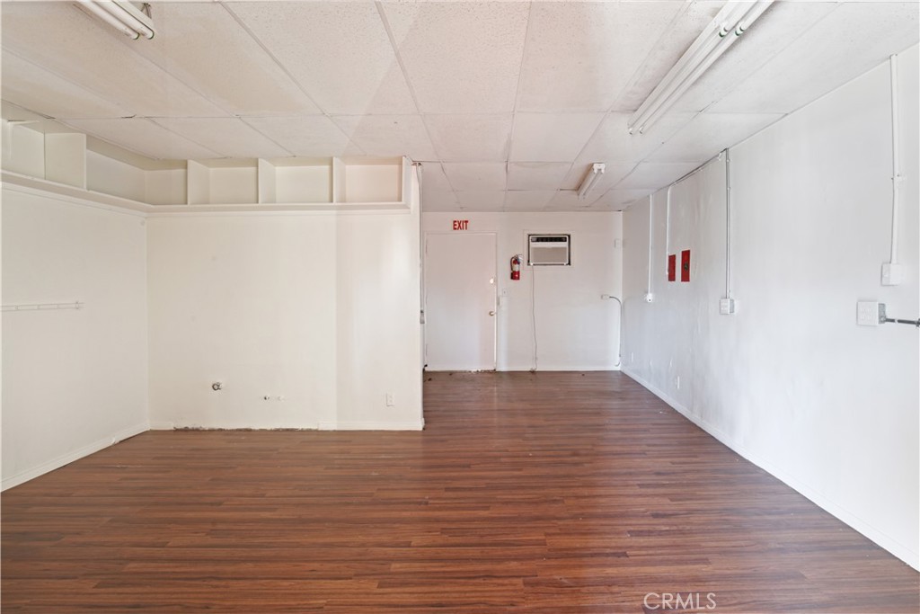 8949 Atlantic Avenue South Gate, CA 90280 - Photo 7 of 43 a view of empty room with wooden floor
