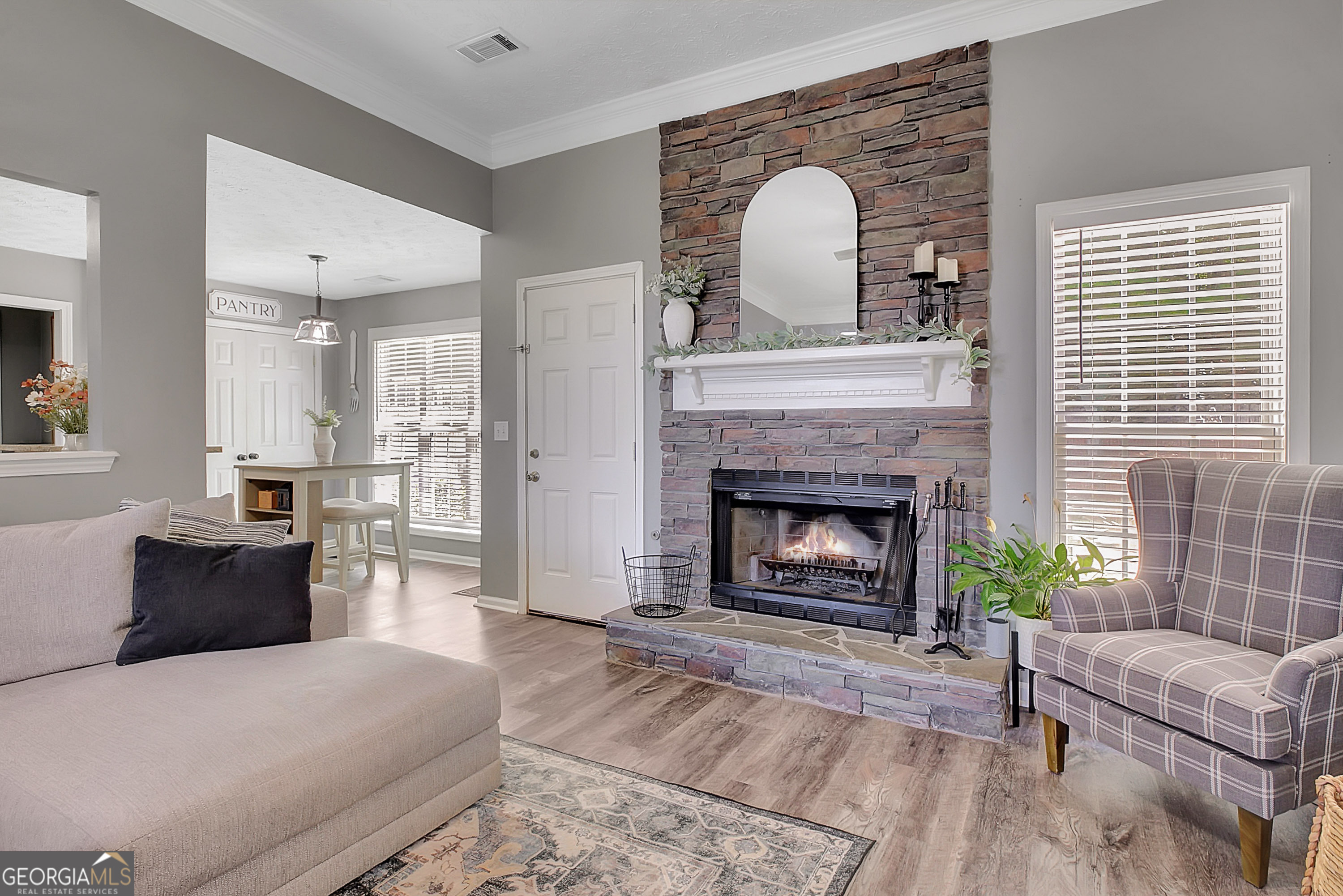 229 John Lovelace Road LaGrange, GA 30241 - Photo 22 of 59 a living room with furniture and a fireplace