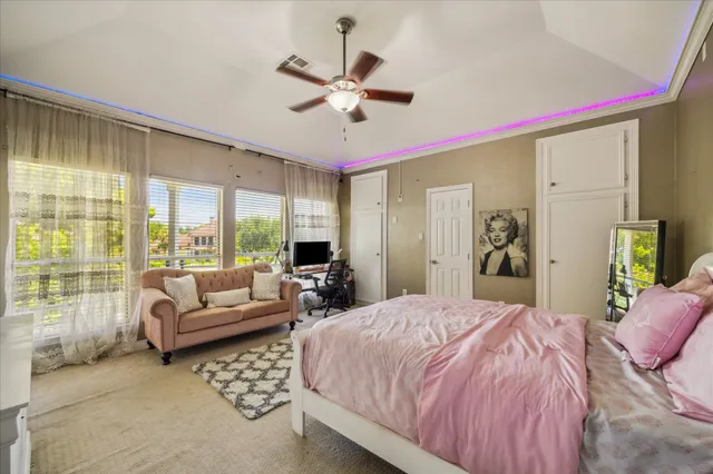 a bathroom with a granite countertop sink toilet a mirror and shower