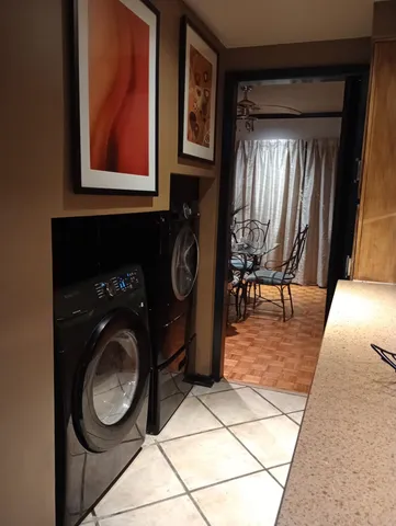 a view of living room washer and dryer