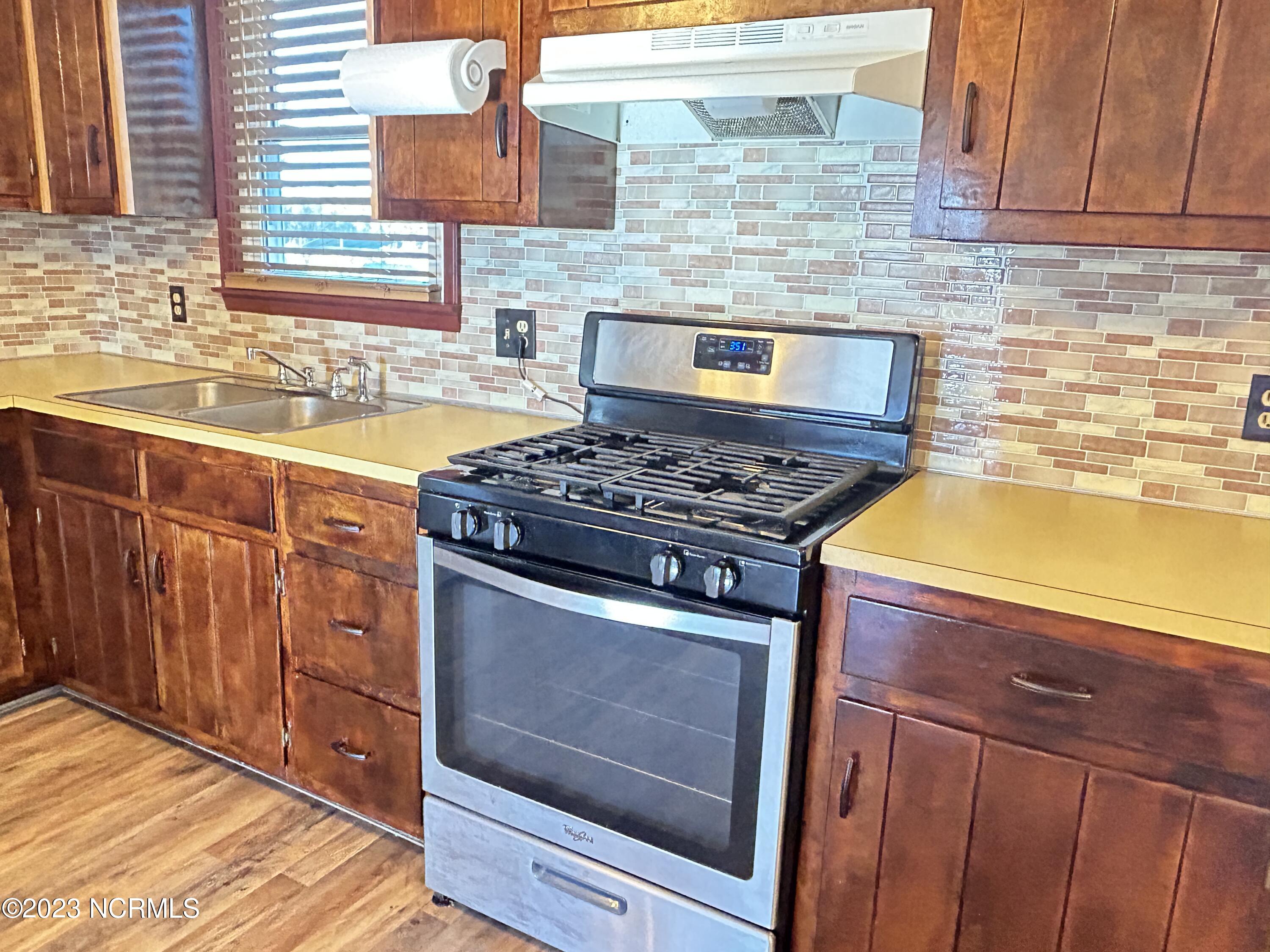 6409 Mary Chapel Road Scotland Neck, NC 27874 - Photo 28 of 51 back wall of kitchen