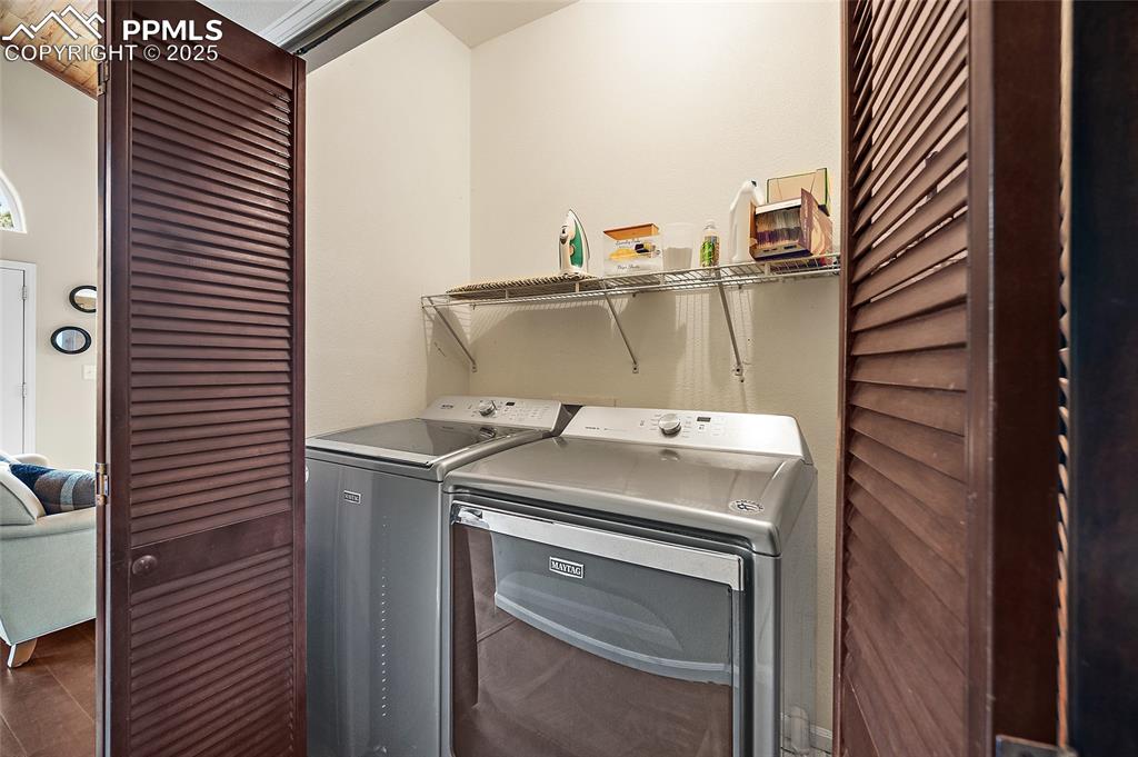 9845 Mesa Road Cascade, CO 80809 - Photo 28 of 50 a utility room with dryer and washer