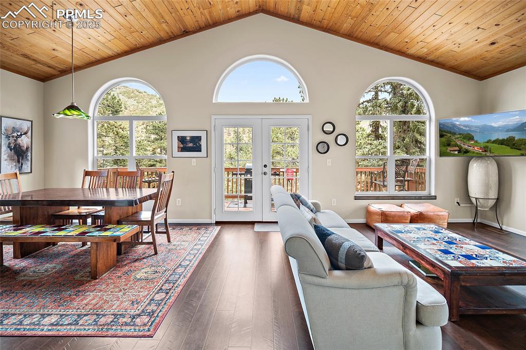 9845 Mesa Road Cascade, CO 80809 - Photo 3 of 50 a living room with furniture and a large window