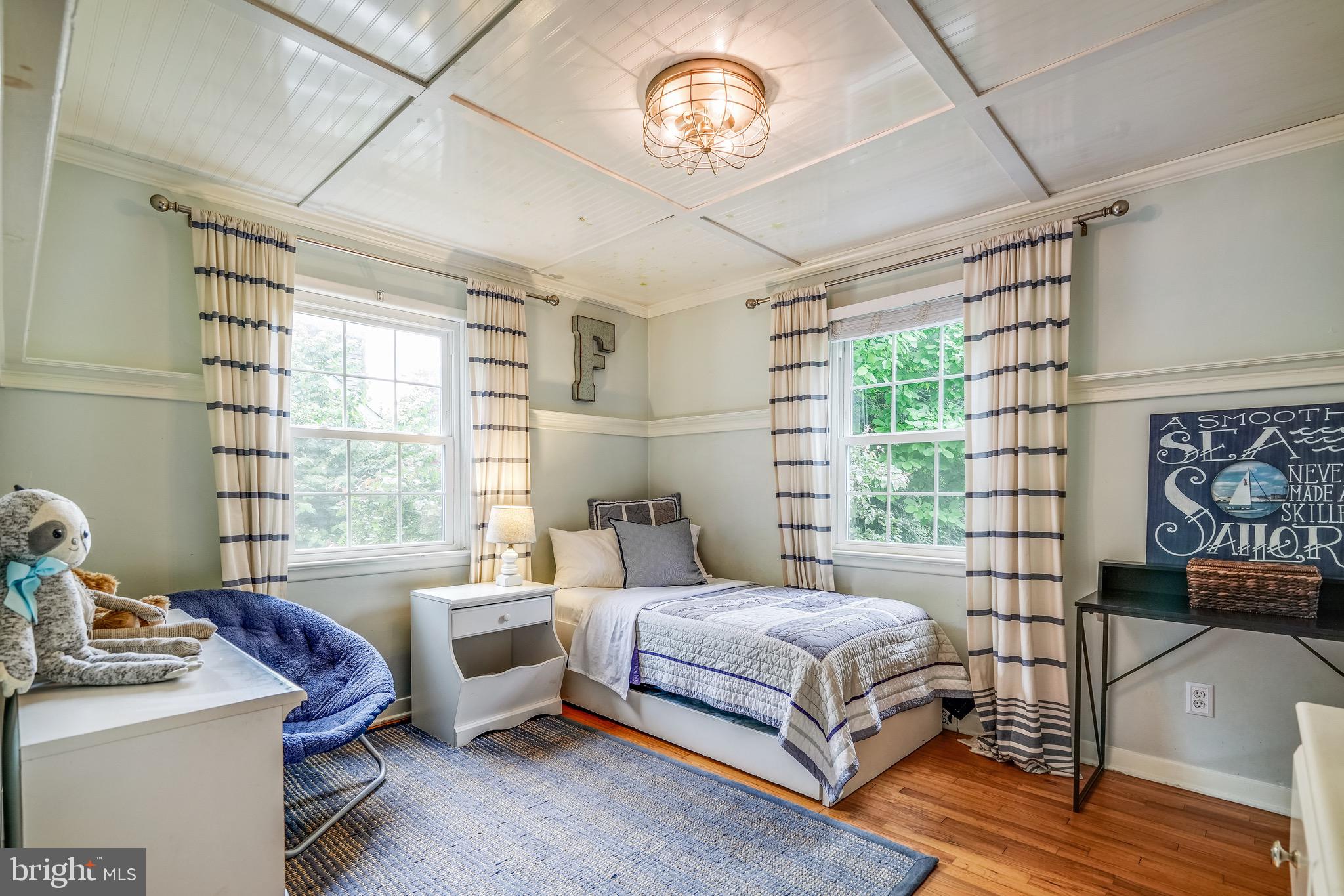 202 Burd Street Pennington, NJ 08534 - Photo 15 of 30 a bedroom with a bed and a window