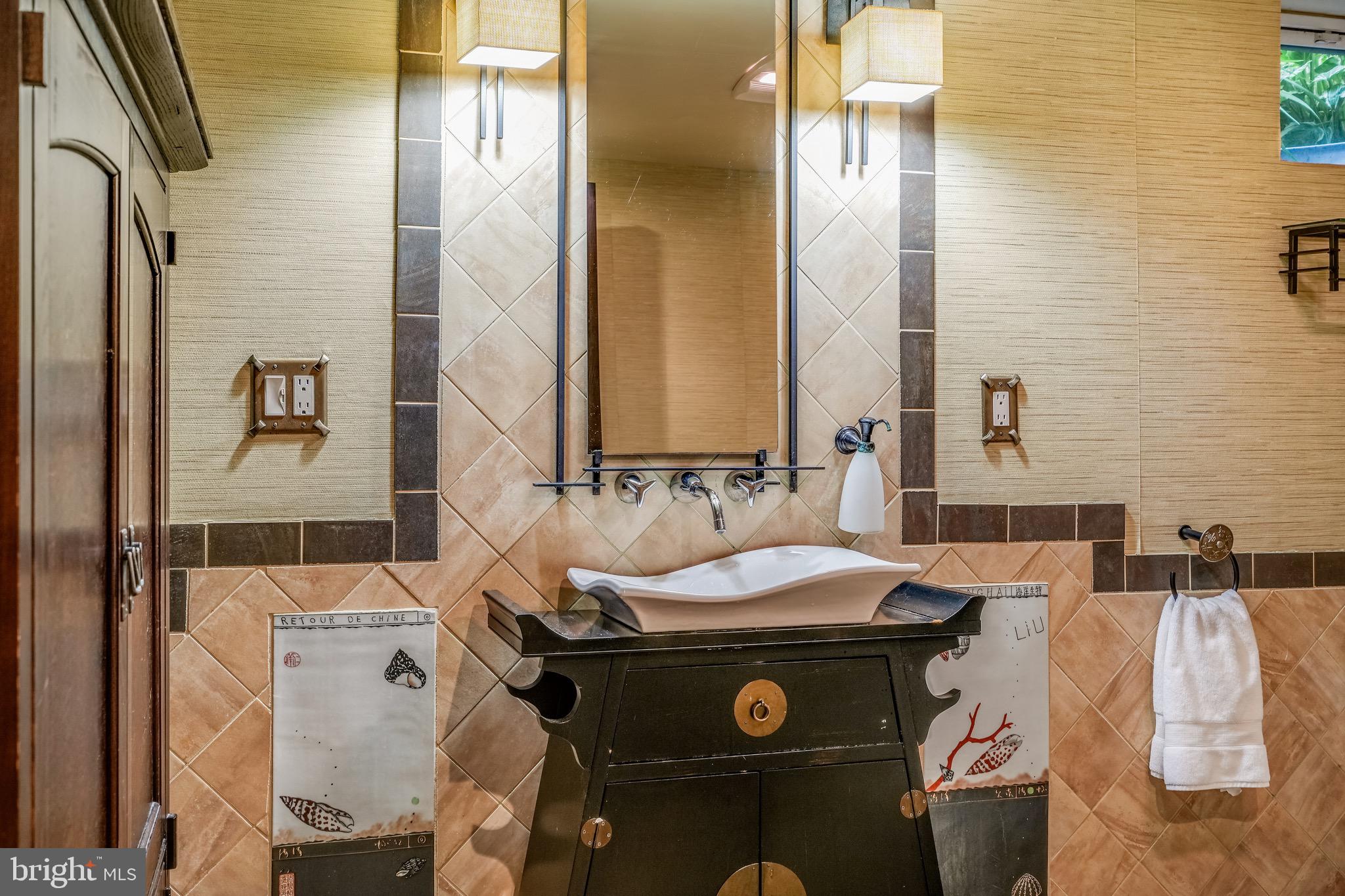 202 Burd Street Pennington, NJ 08534 - Photo 24 of 30 a bathroom with a sink and a mirror