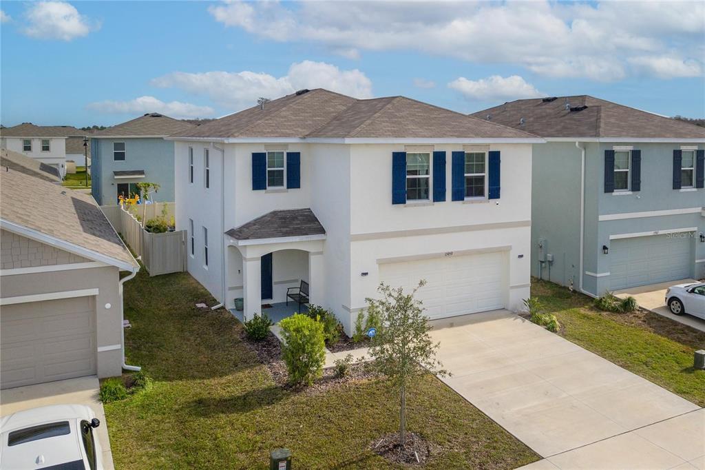 15959 Tuscany Hillside Road Odessa, FL 33556 - Photo 1 of 1 front view of a house with a yard