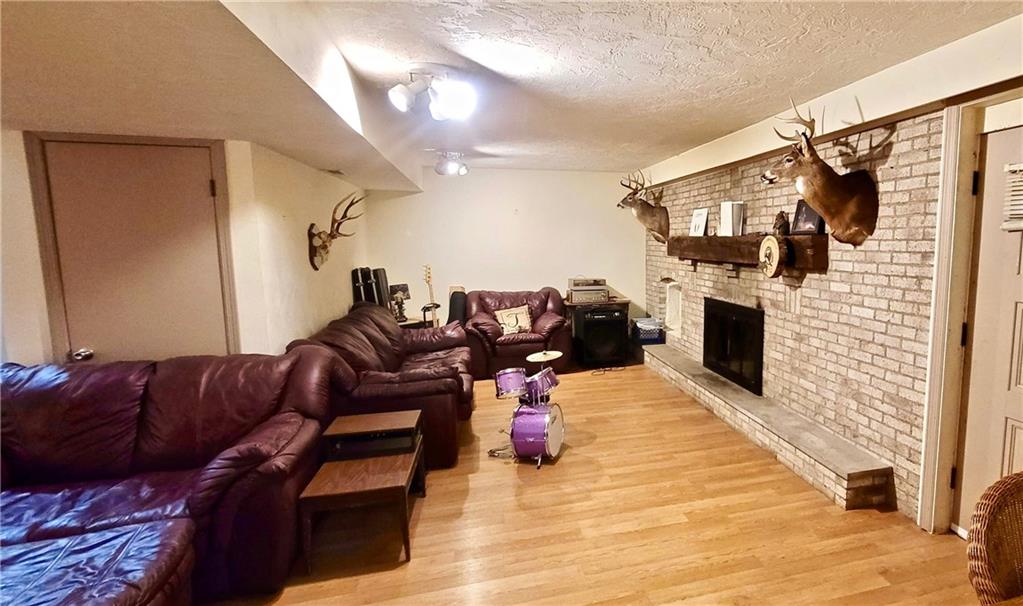 1535 Martin Road Tarentum, PA 15084 - Photo 16 of 25 a living room with furniture and a fireplace