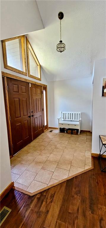1535 Martin Road Tarentum, PA 15084 - Photo 7 of 25 a view of a livingroom with wooden floor and staircase