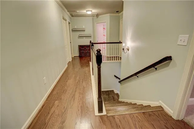 a view of entryway with wooden floor
