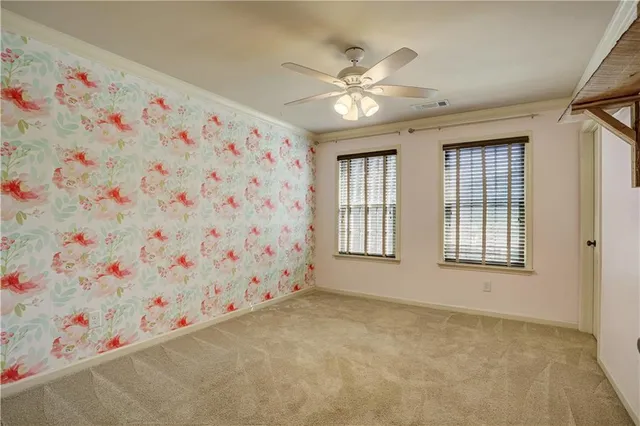 a view of a livingroom with window and furniture