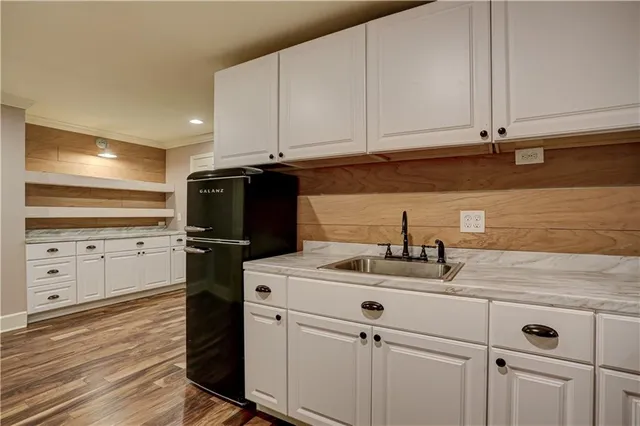 a view of a kitchen with cabinets