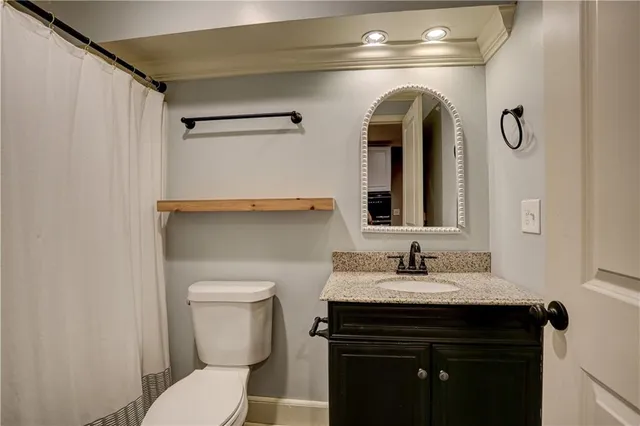 a view of balcony with wooden floor