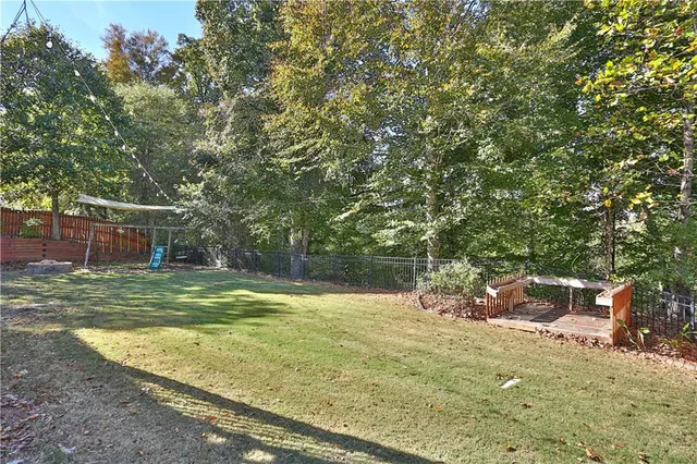 a view of a house with a swimming pool