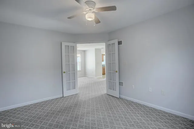 a view of a hallway with closet