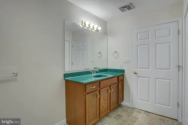 a bathroom with a sink a toilet and a bathtub