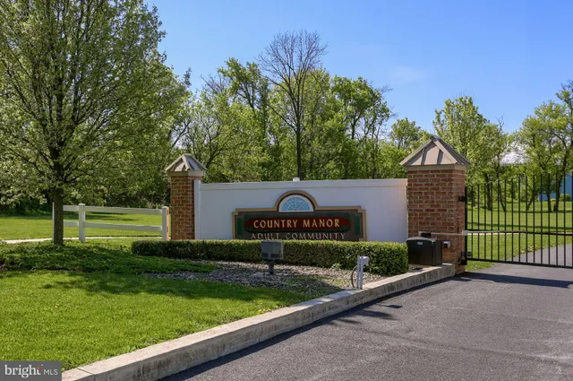 a view of a street with a houses