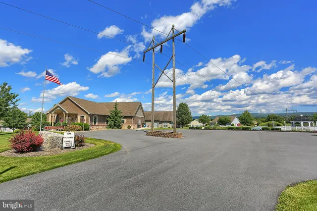 a view of a lake with a house