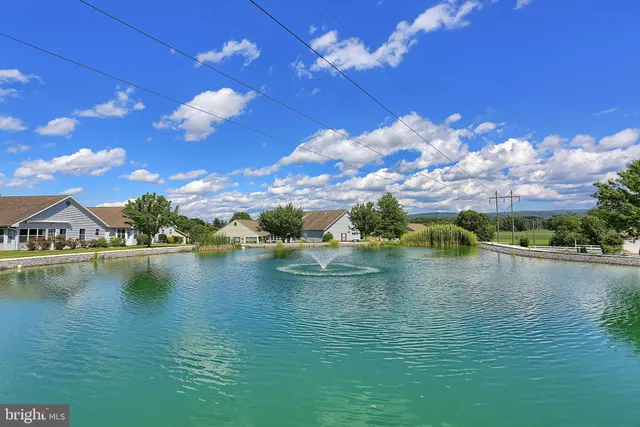 a view of a house with basketball court