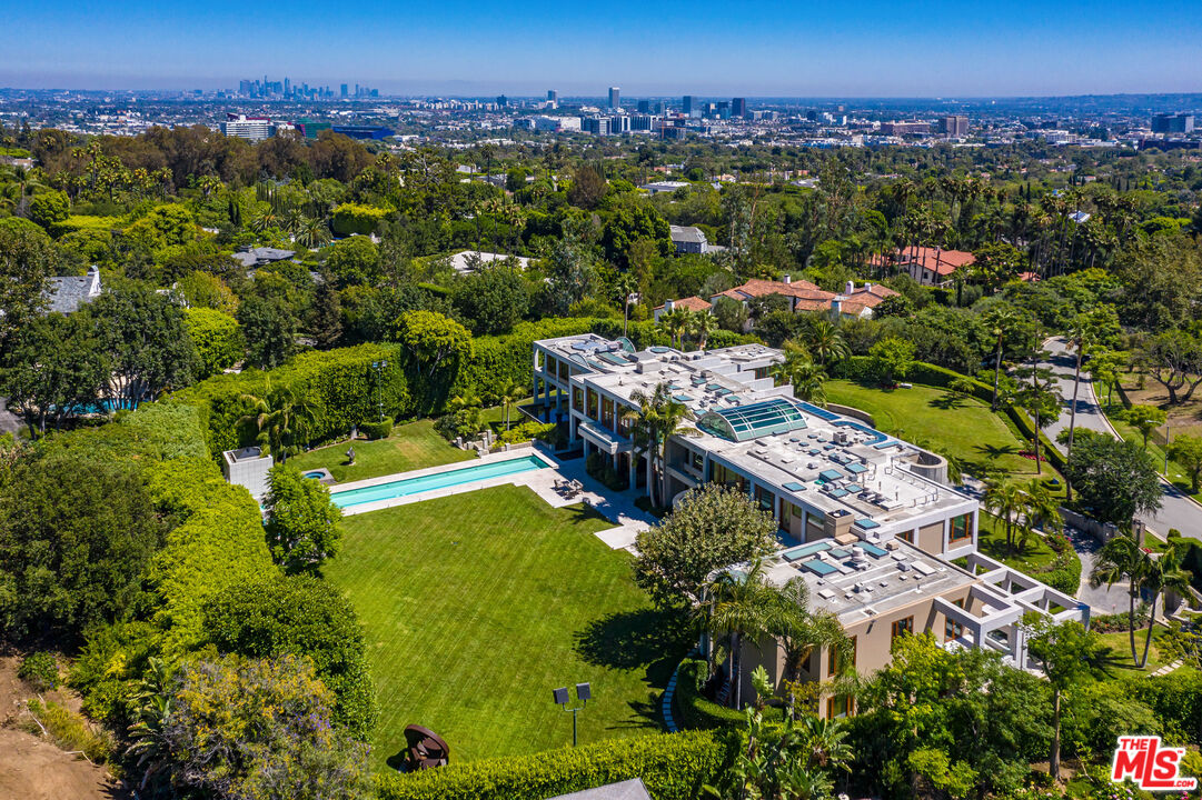 601 Mountain Drive Beverly Hills, CA 90210 - Photo 2 of 6 an aerial view of residential houses with outdoor space and trees