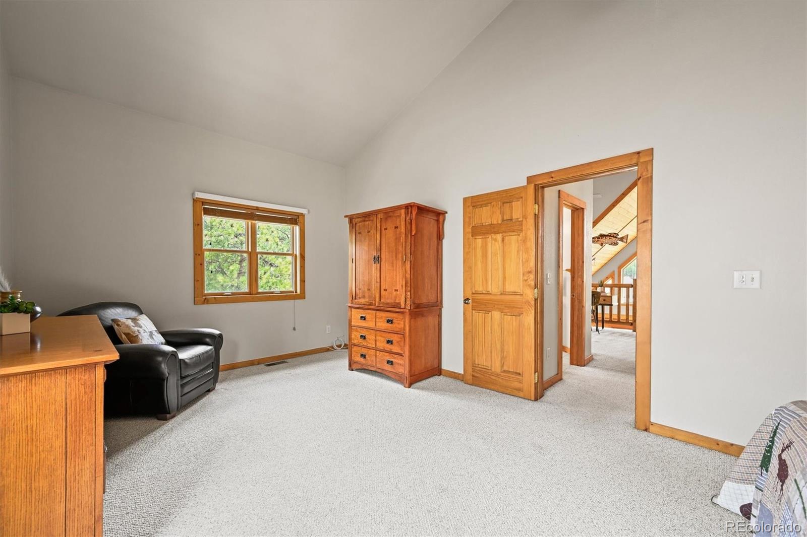 9868 South Overlook Road Sedalia, CO 80135 - Photo 11 of 50 a view of an empty room with a window