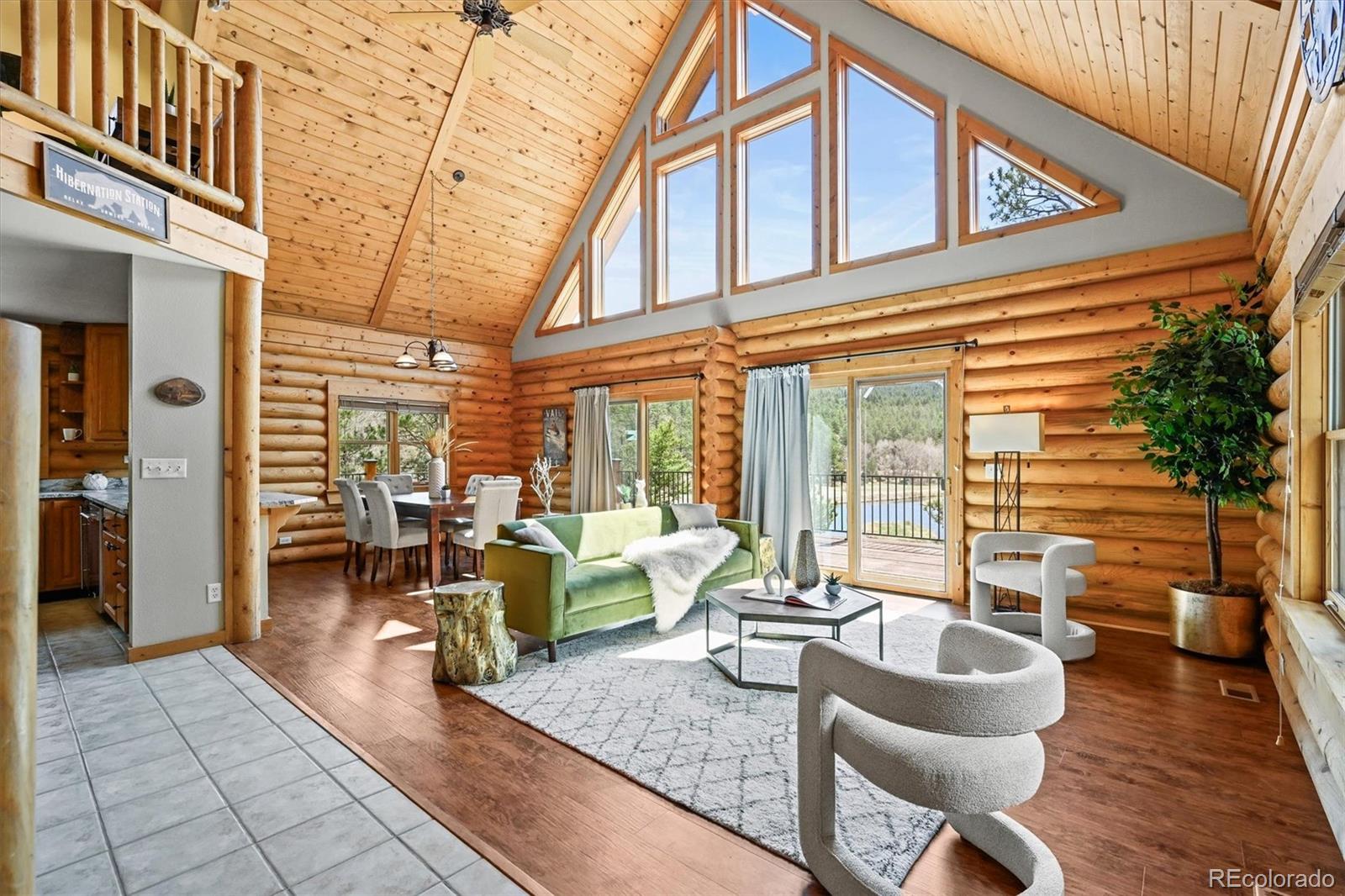 9868 South Overlook Road Sedalia, CO 80135 - Photo 3 of 50 a view of a living room and livingroom with furniture