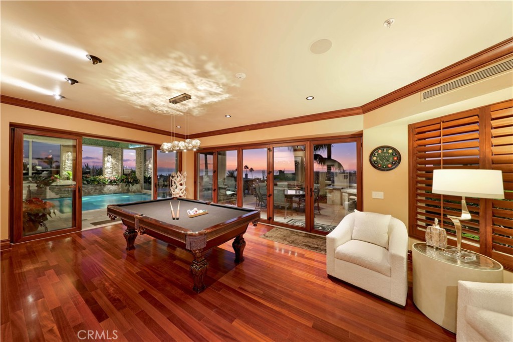 51 Ritz Cove Drive Dana Point, CA 92629 - Photo 32 of 51 a living room with furniture a rug and a large window