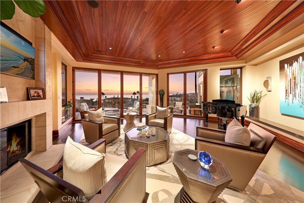 51 Ritz Cove Drive Dana Point, CA 92629 - Photo 5 of 51 a living room with fireplace furniture and a large window