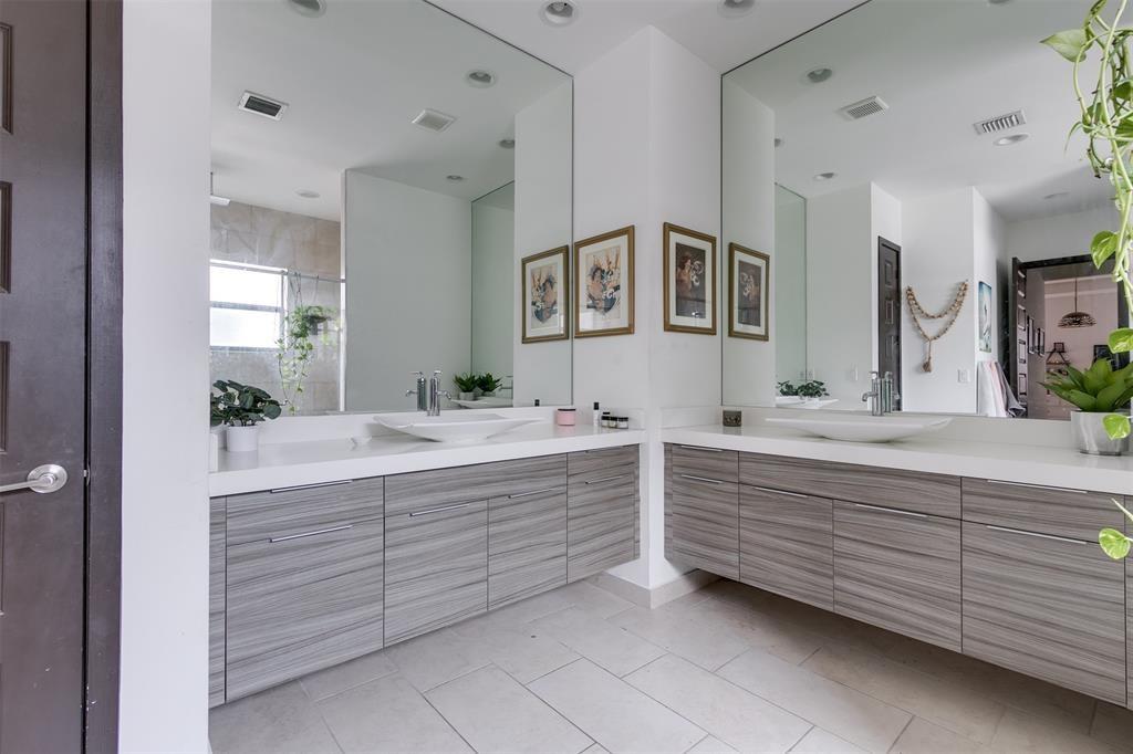 15901 Southwest 136 Way Miami, FL 33196 - Photo 24 of 34 a bathroom with a granite countertop sink double vanity