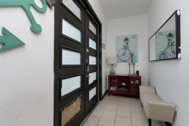 a view of workspace with window and furniture