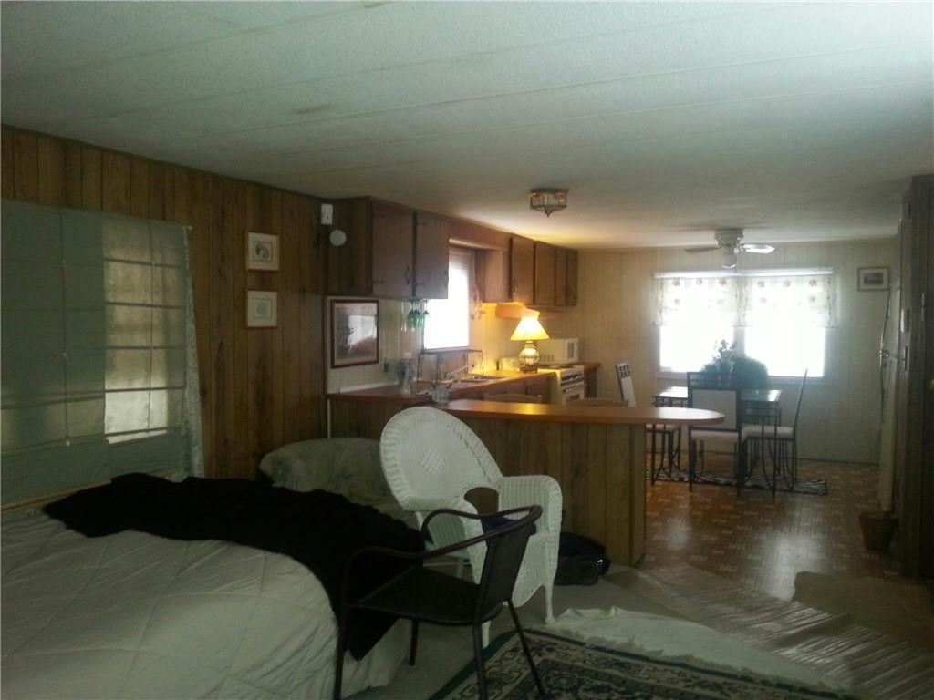 64 Dinsmore Cross Road Bowdoinham, ME 04008 - Photo 7 of 14 LIVING ROOM TO KITCHEN
