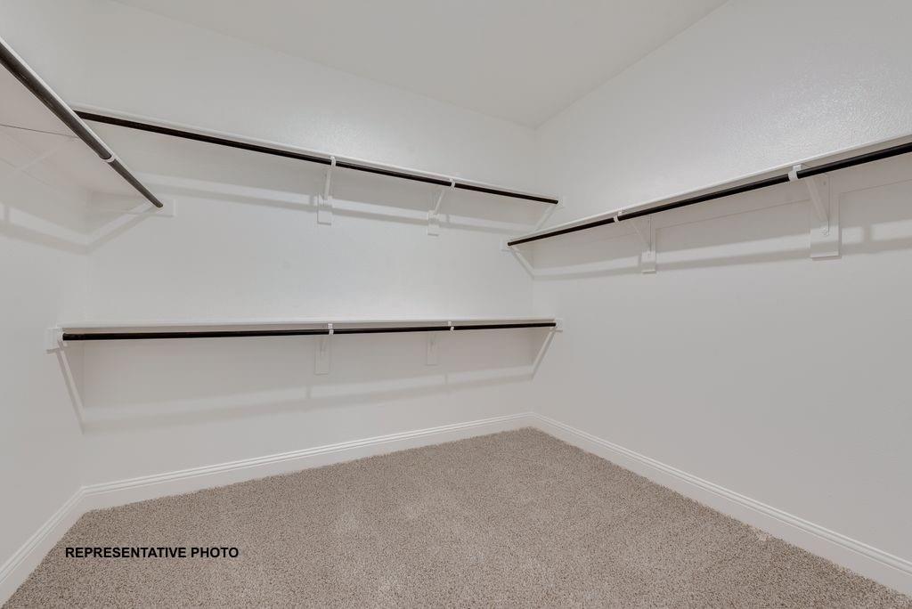 509 Clifton Court Springtown, TX 76082 - Photo 13 of 21 a view of an empty walk in closet