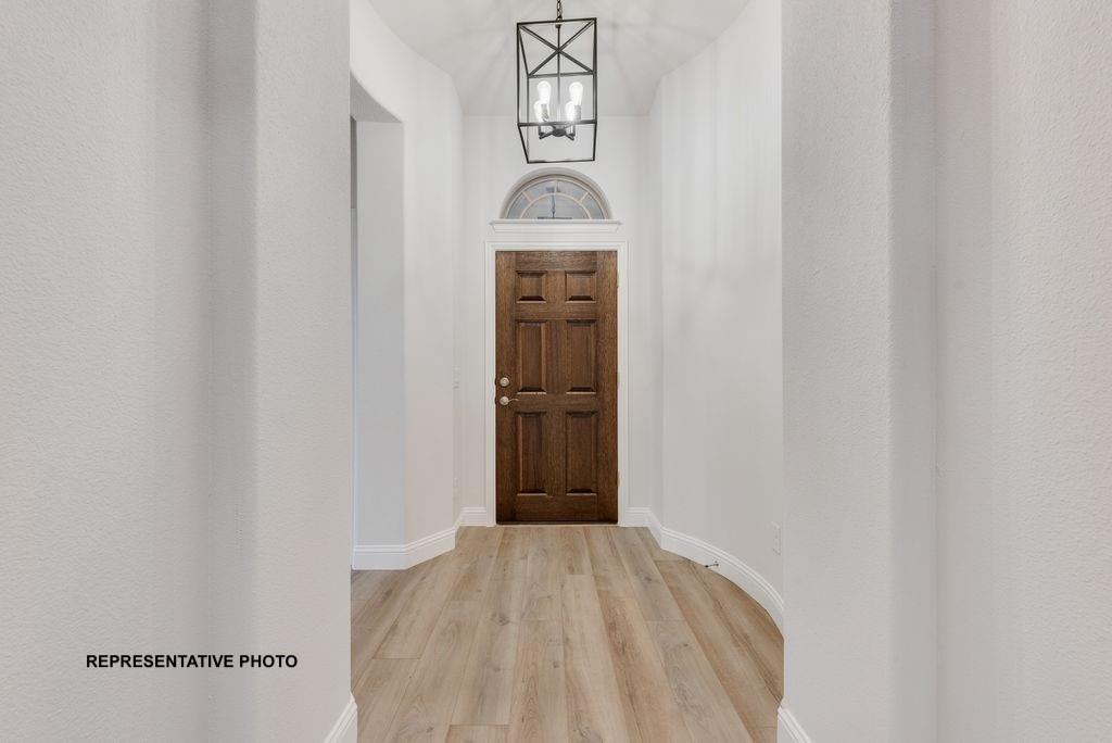 509 Clifton Court Springtown, TX 76082 - Photo 2 of 21 a view of a hallway to rooms