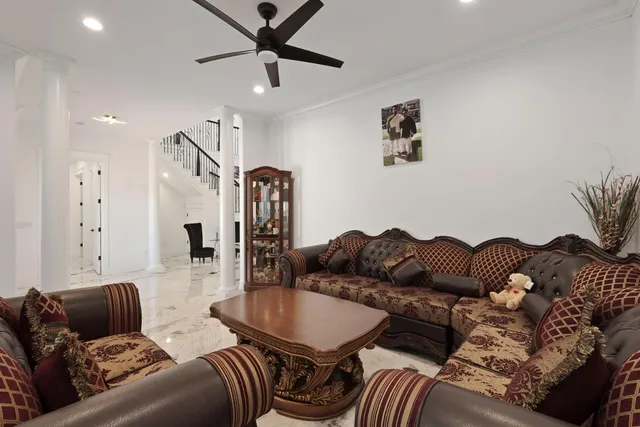 a kitchen with stainless steel appliances kitchen island granite countertop a sink and cabinets