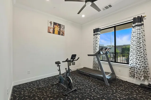 a room with furniture and pool table