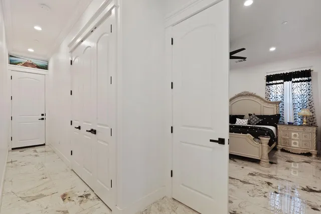 a bathroom with a double vanity sink mirror and shower